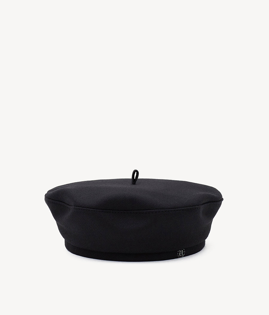 44_10_40, Ruslan Baginskiy Black Wool BeretBeret — a close-fitting headpiece with a soft shape and signature round silhouette. The structured design makes it easy to style. Made from natural wool in a tightly woven black shade, extending its seasonal versatility. It is complemented by a loop and hand-embroidered RB monogram on the band.Handcrafted in Ukraine.