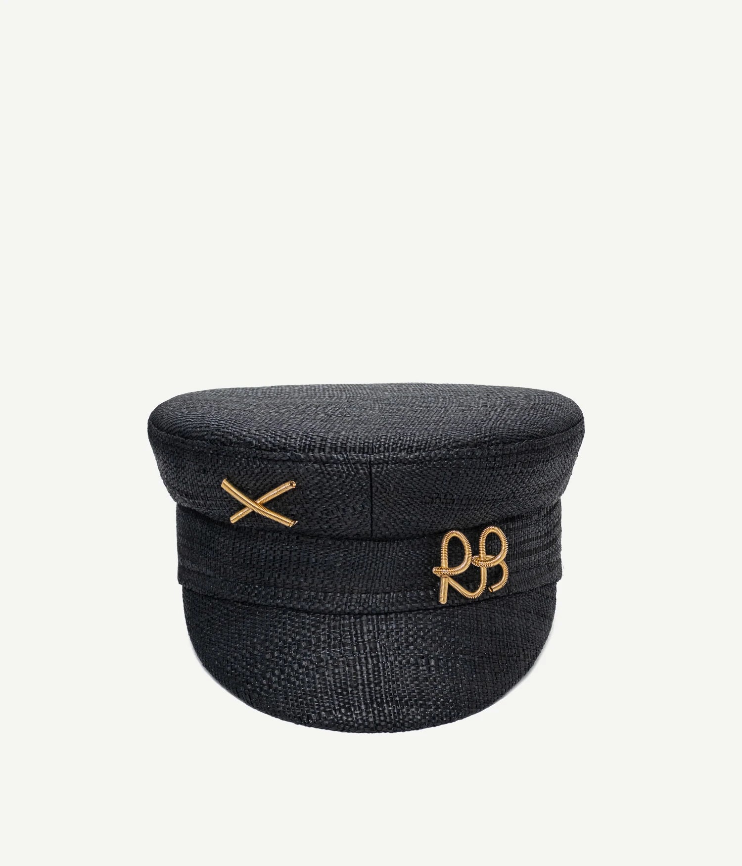 ALLwithoudDIS, Ruslan Baginskiy Black Linen Baker Boy Cap with LogoA signature shape of the brand. The textured structure of natural black straw adds definition to the clean geometry of the cap. Finished with gold-tone RB logo and cross.Handcrafted in Ukraine.