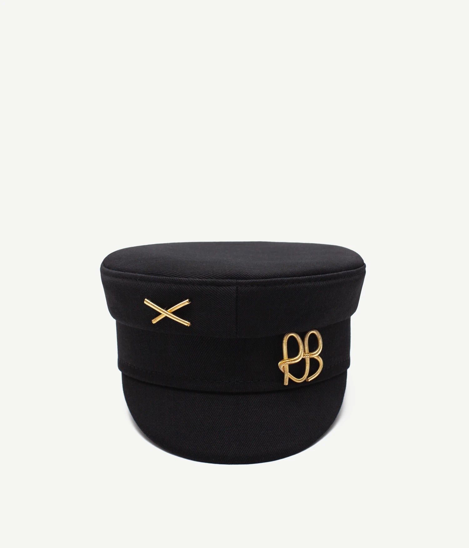 ALLwithoudDIS, Ruslan Baginskiy Black Baker Boy Cap with LogoA signature shape of the brand. The clean silhouette is highlighted by textured deep black fabric. Finished with a gold metal RB logo and cross.Handcrafted in Ukraine.