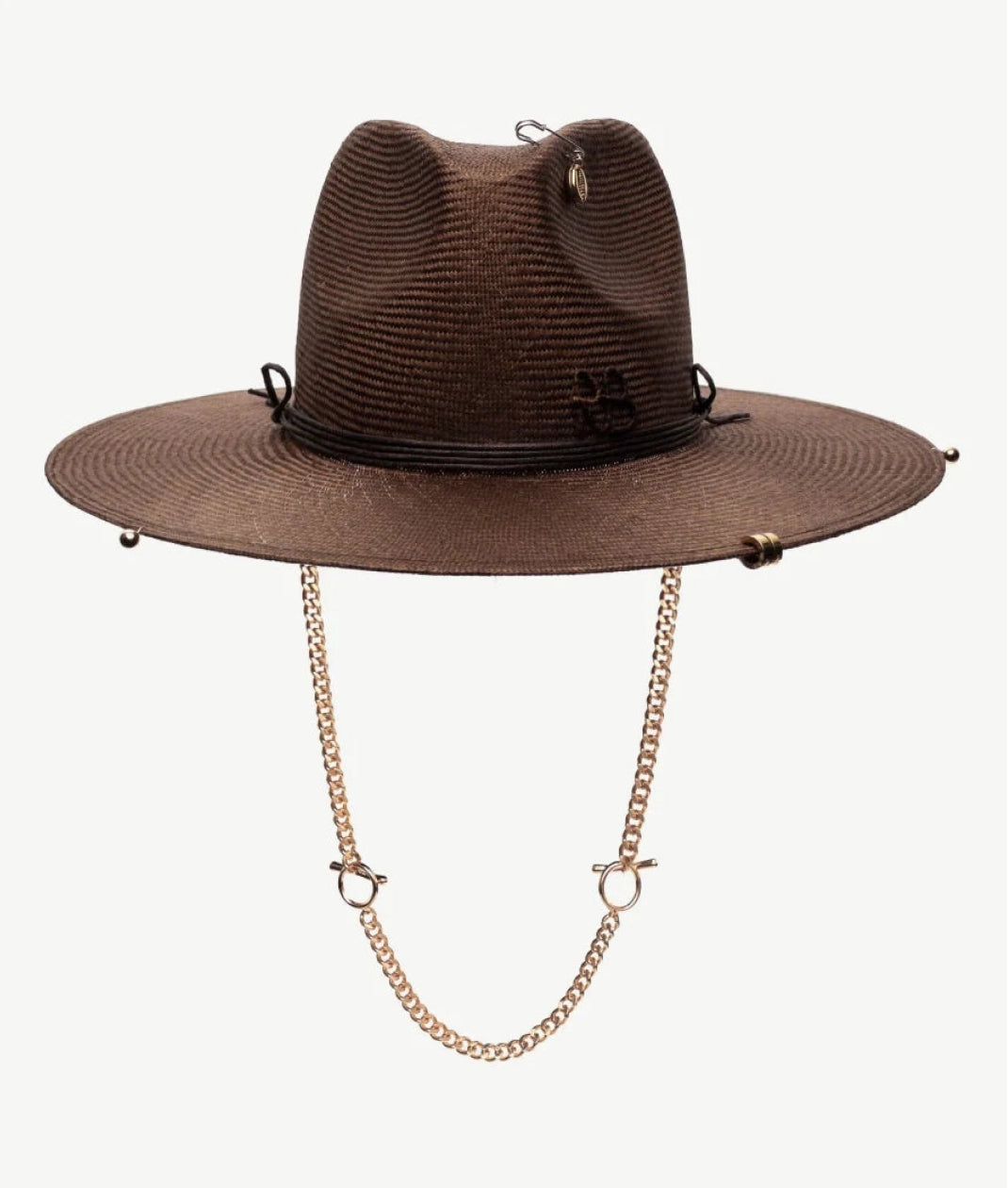 All Hat shapes, Ruslan Baginskiy Brown Fedora with ChainThe fedora — a hat with a defined silhouette, featuring a pinched crown and medium brim. Crafted from natural straw in a warm brown shade, detailed with a removable metal chain, accent piercing, safety pin, and cotton trim. Finished with a hand-embroidered RB monogram.Handcrafted in Ukraine.
