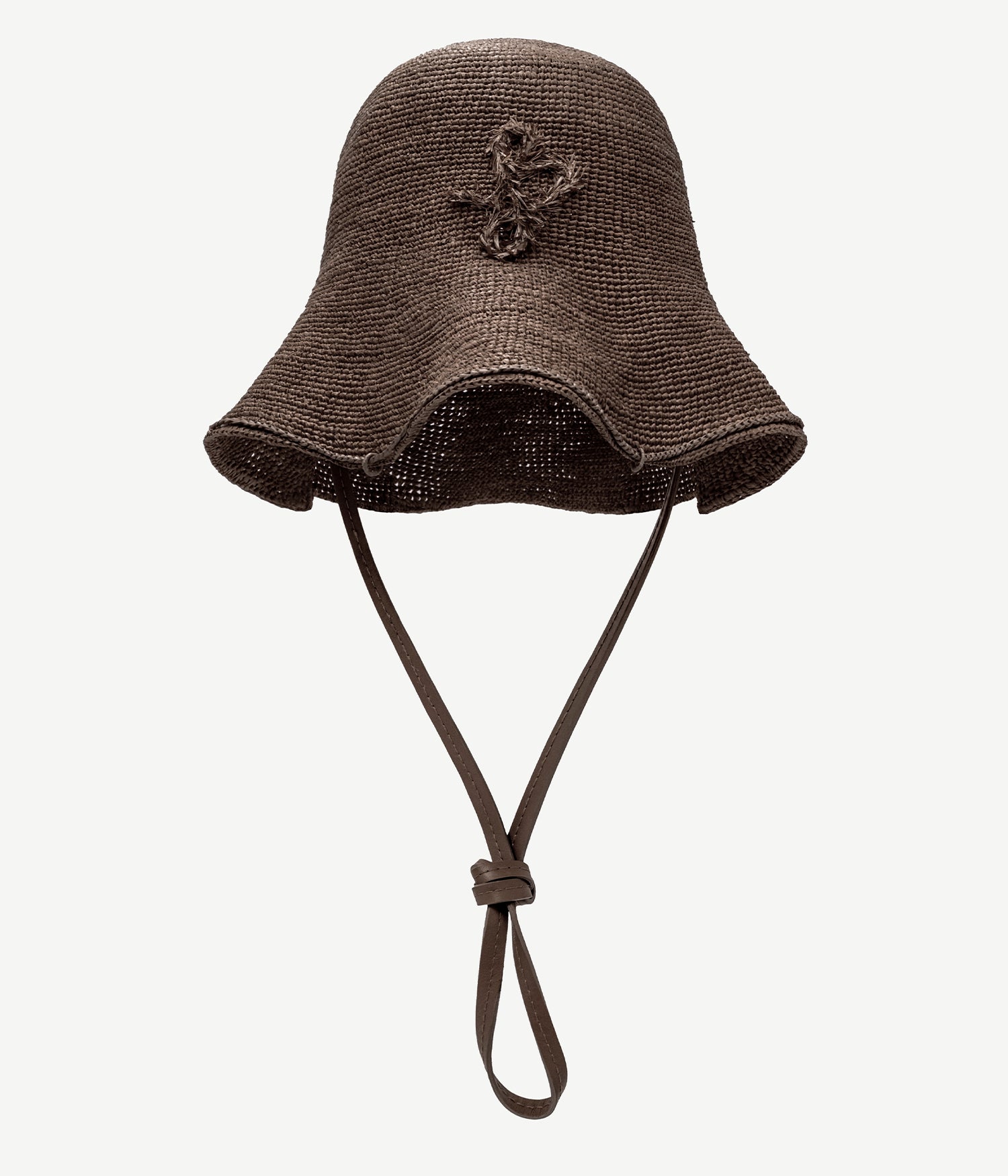 ALLwithoudDIS, Ruslan Baginskiy Brown HatBagThe HatBag is a signature Ruslan Baginskiy silhouette that reflects the brand’s evolution, shaped by over eight years of craftsmanship in headwear.A functional transformer, the HatBag can be worn as a headpiece or carried as a bag using the long leather strap. Crafted from brown paper raffia — an eco-friendly, lightweight, and textured material. Finished with a hand-embroidered monogram. Easy to wear and style.Handcrafted in Ukraine.